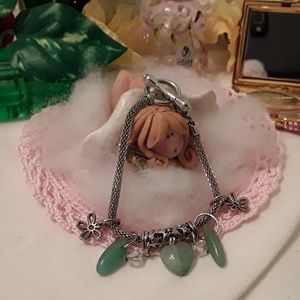 ANTIQUED SILVER MESH JADE AND CRYSTAL TOGGLE BRAC.